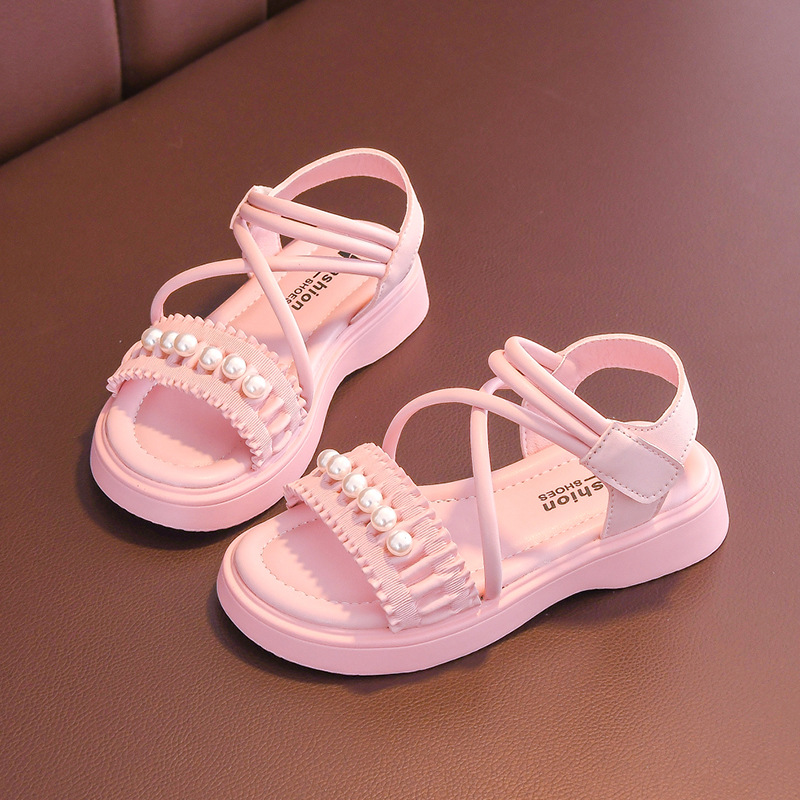 Sandalias para niñas 2025 verano nuevo estilo zapatos de princesa para niños zapatos de playa de suela suave antideslizante de suela suave zapatos para niñas de mediana edad