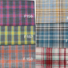 涤棉色织格子布衬衫面料新款涤棉磨毛色织橘灰黄灰格子衬衫面料