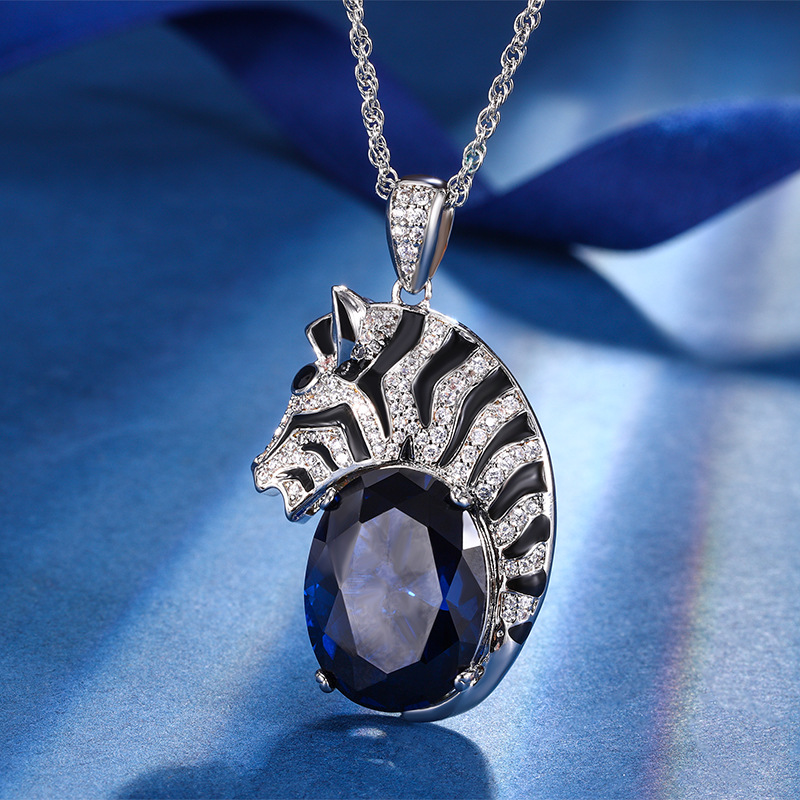 Otoño e Invierno nuevo estilo Zhuang Sheng joyas nuevo fondo de cobre chapado en oro cebra luz personalidad de lujo exagerado colgante piedra principal 15*20