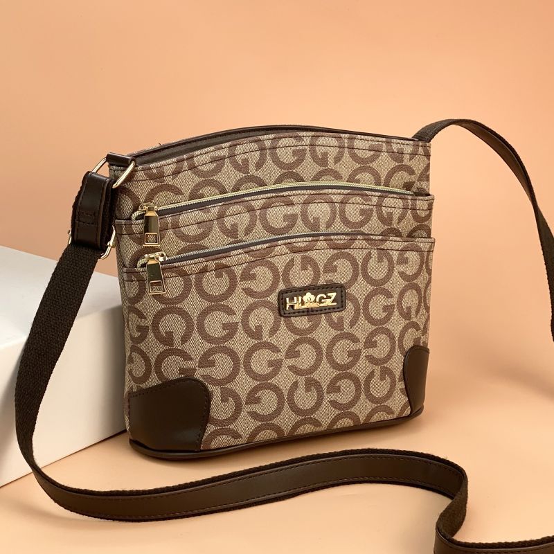 Guangzhou Hengli equipaje para mujer 2025 nuevo estilo coreano bolso de mensajero de un solo hombro bolso de cubo madre de mediana edad bolso de varias capas mujer