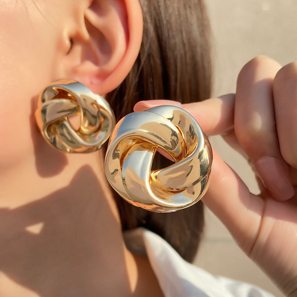 Moda europea y americana exagerada creativa todo partido torcido personalidad aleación Stud pendientes de las mujeres geométricas retro Hong Kong estilo pendientes