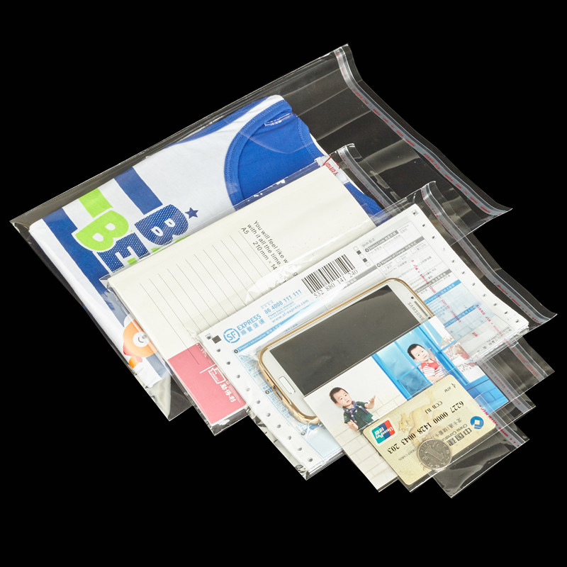 Bolsa de joyería transparente fábrica en stock al por mayor auto-Sellado ropa calcetines ropa bolsa de embalaje bolsa caliente OPP auto-adhesivo