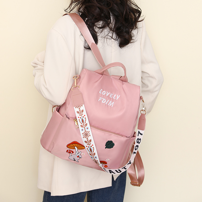 Mochila antirrobo para mujer 2025 primavera nueva moda de nailon salvaje mochila para mujer mochila de viaje de doble uso