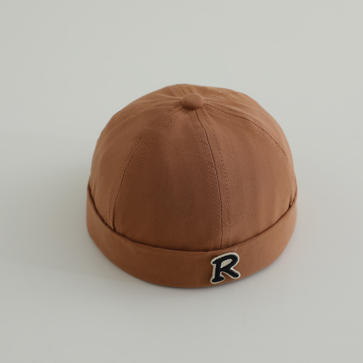 Primavera niños terratenientes sombreros hombres y mujeres letras de la marea sin bordes sombreros de piel de melón sombreros de calabaza sombreros de boina de personalidad