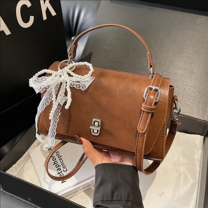 Bolso retro para mujeres 2026 nueva primavera coreana simple de alta calidad bolso de mano pequeño bolso de hombro universal image 1