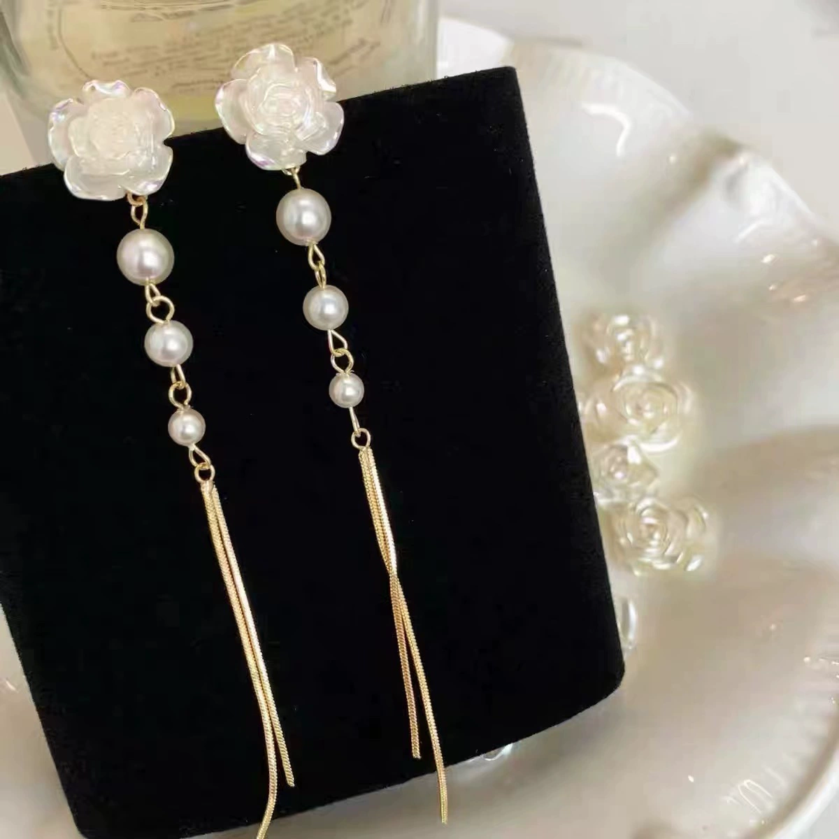White long mountain tea, small design sophisticated earrings with tassels from pearl, french style, simple and elegant design