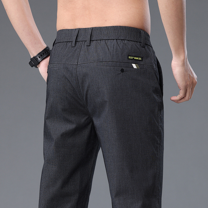 Pantalones casuales de hombre de gama alta primavera/verano 2023 nuevos pantalones de traje casual de negocios verano alto elástico recto sin planchar pantalones de hombre