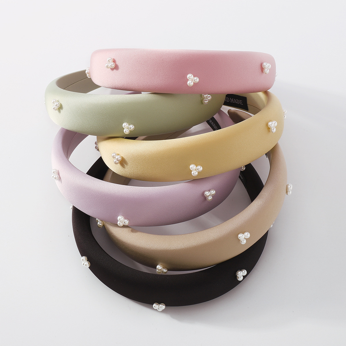 Simple Fashion Solid Color Artificial Pearl Fabric Hair Band display picture 1