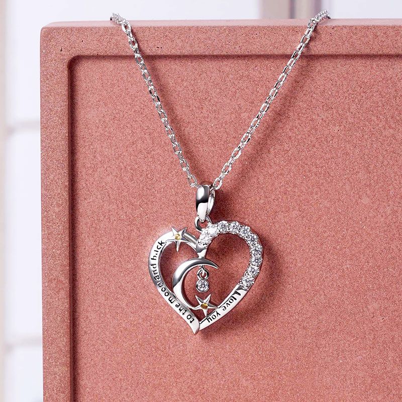 Collana con pendente a forma di cuore stella e luna gioielli donna_voghion.com