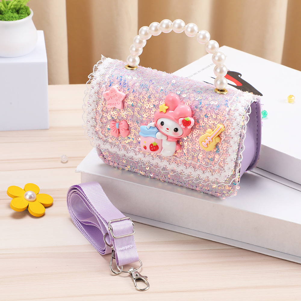 Monedero infantil con lazo, mochila pequeña, bolso bandolera de dibujos animados My Melody para niña, lentejuelas que reducen el peso