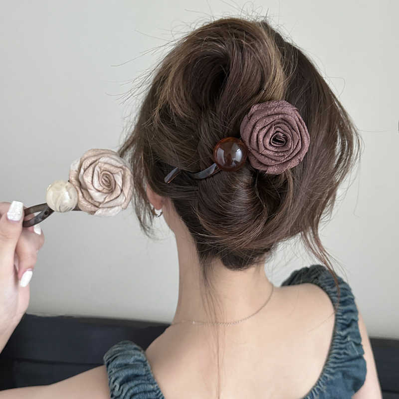 Mellard rosa seca clip para el cabello para mujeres 2025 nuevo clip de torsión de alta sensación clip de agarre detrás de la cabeza cabeza cabeza gorda gorda tocado