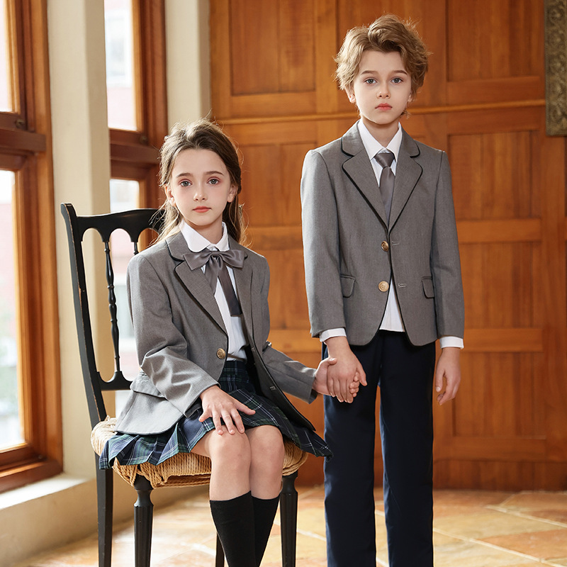 Uniformes escolares de niños, traje de estilo universitario, traje de jardín de infantes, primavera y otoño, traje de estilo inglés de cuatro piezas.