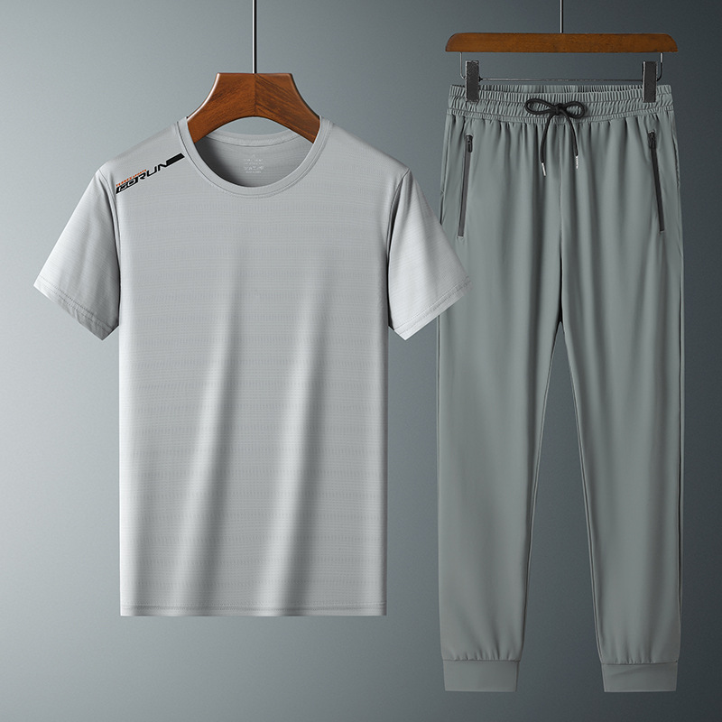 Moda pantalones de seda de hielo cuello redondo Camiseta de dos piezas para hombres talla grande suelta de secado rápido traje deportivo LOGO se puede formular