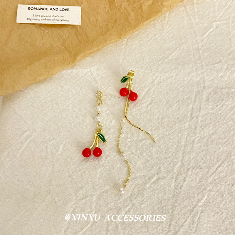 Demi-season red asymmetrical small design long earrings with tassels