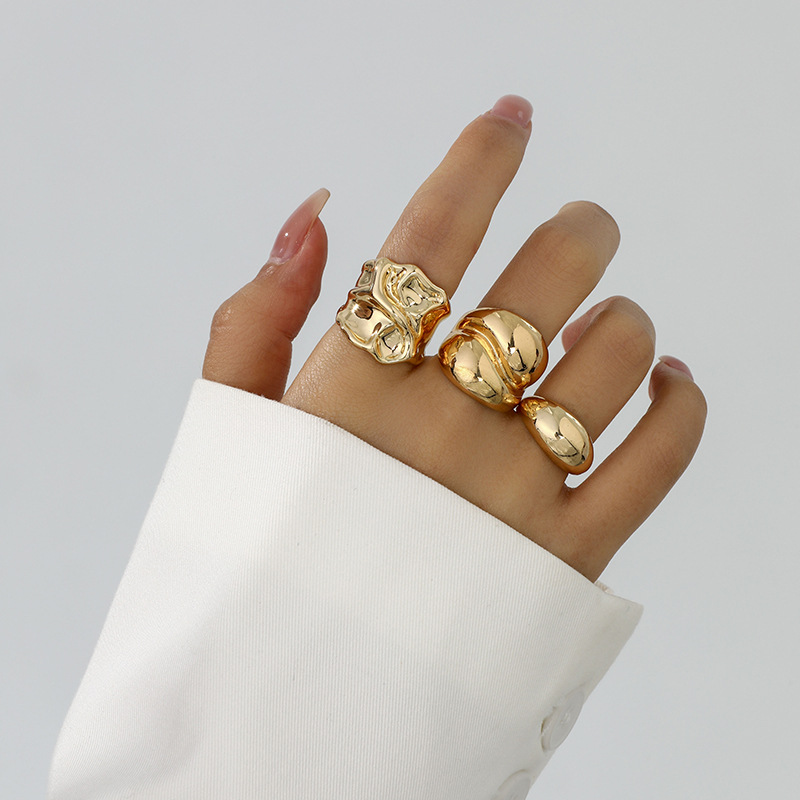 Estilo explosivo transfronterizo europeo y americano, gota de agua brillante, abrazo, anillo abierto, pliegues de metal líquido, anillo cruzado irregular image 9
