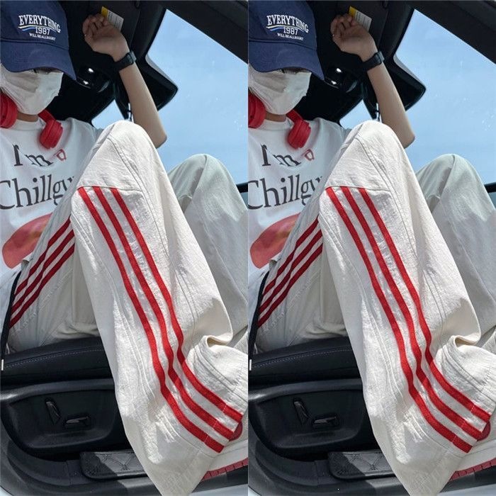 Pantalones de hielo de verano de tres barras para hombres delgados pantalones deportivos largos sueltos rectos de piernas anchas pantalones casuales de hombre