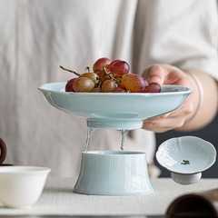 中国式家庭用陶磁器の高い足の水たまりの果物の皿禅意のお茶のお菓子の皿の茶道の部品の高い足のお茶の皿は仏の果物の皿に供えます。