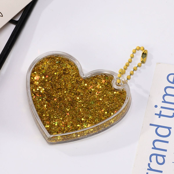 Golden love flowing sand contains bead chain