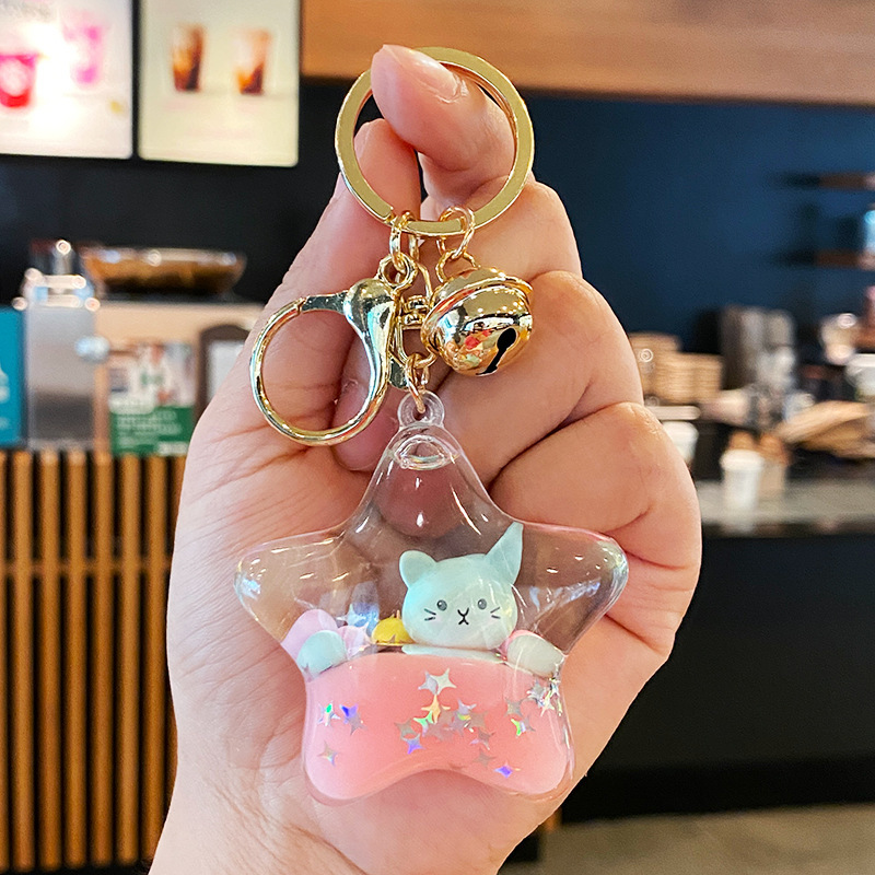 Cute cat quicksand bottle keychain female creative cartoon schoolbag pendant exquisite small jewelry children graduation gift