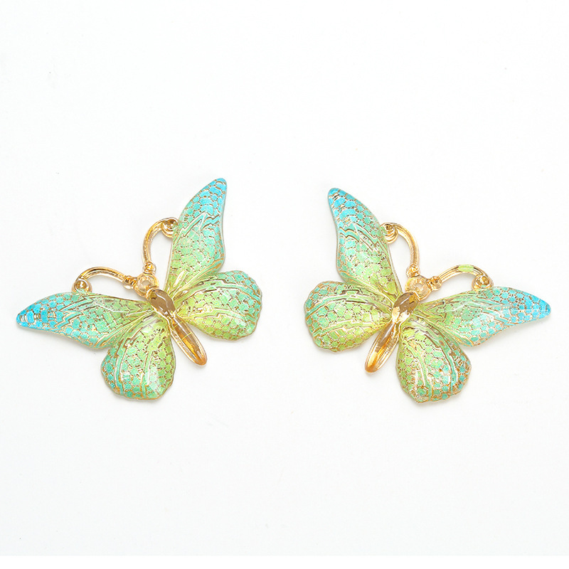 Colgante de mariposa transfronteriza de color creativo de personalidad acrílico europeo y americano bolsas de auriculares bolsas de decoración accesorios