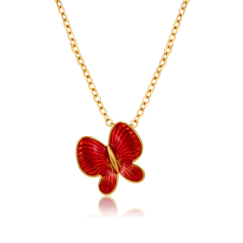 Joyería de xupe colorido esmalte gota aceite mariposa colgante temperamento femenino Corea del Sur simple nicho colgante de verano joyería