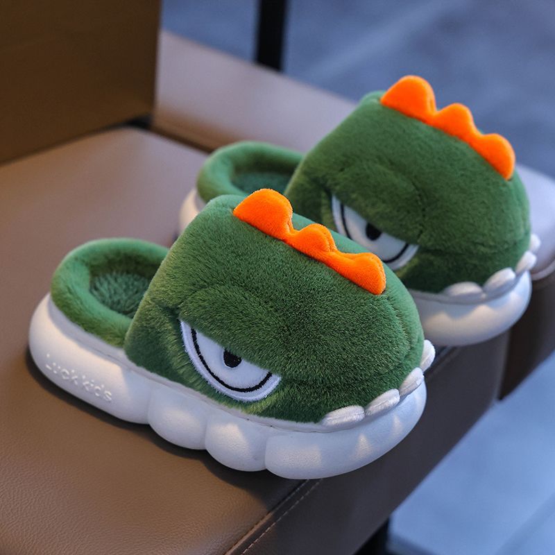 Otoño y invierno zapatillas de algodón para niños dinosaurios cálidos y bolsas de pelusa con zapatos de algodón antideslizantes para niños caseros
