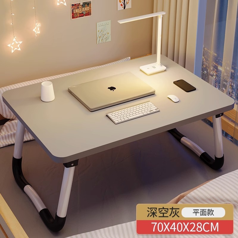 折り畳み式のベッドの上の小さい机のコンピュータの机の学生の寮の上で学習の机を敷きます。|undefined