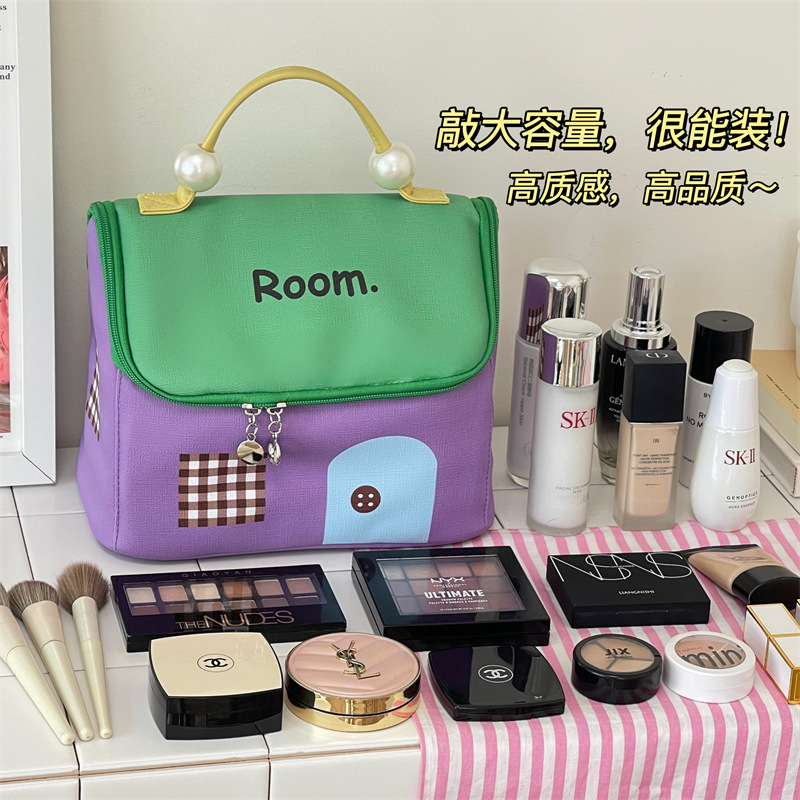Nueva linda casa pequeña bolsa de maquillaje de alta belleza portátil bolsa de lavado de viaje bolsa de almacenamiento de gran capacidad