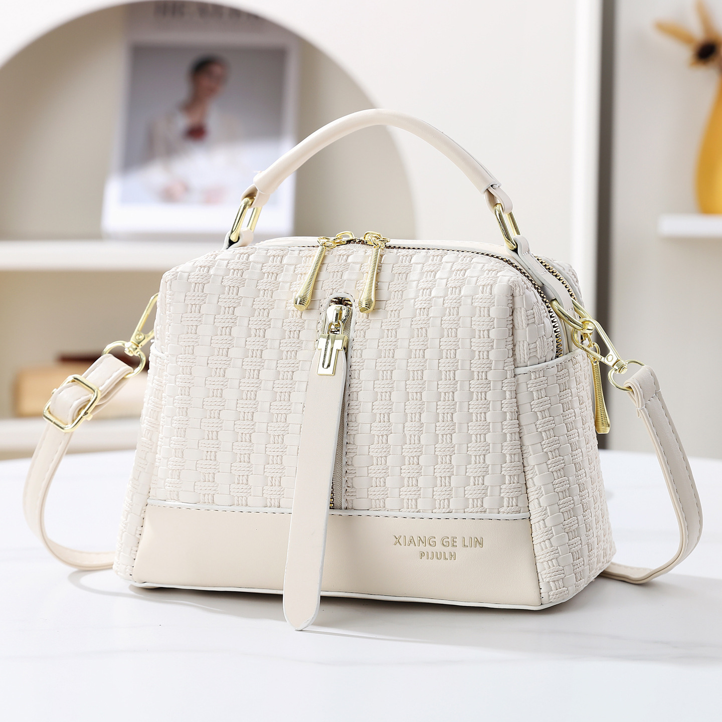 2026 nuevo temperamento de moda tejido bolso de mano textura casual mochila de hombro de gran capacidad bolso de viaje