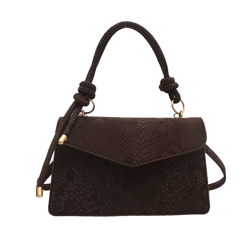 Bolso con estampado de piel de serpiente de diseño de nicho de lujo ligero transfronterizo para mujer 2025 nuevo bolso de mensajero de un solo hombro