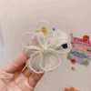 5086 Irregular flowers hair clip-beige color
