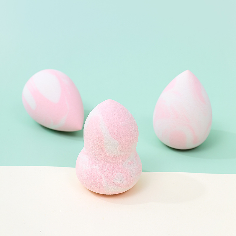 Maquillaje de belleza transfronterizo personalizado de fábrica, soplo de polvo de color mixto, no coma polvo, se agrandará cuando se encuentre con el agua, cojín de aire de esponja de maquillaje seco y húmedo