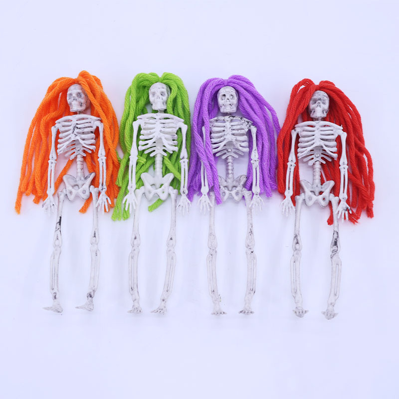 The next day, there will be a cross-border Halloween party venue layout, props, skeletons, hangs up, haunted house festival scene layout