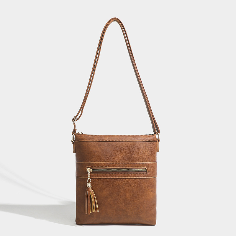 Dames schoudertas in retrostijl met kwastje en ritssluiting_voghion.com