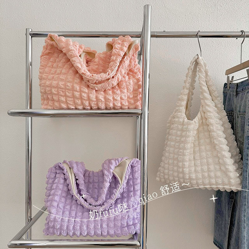 2023 nuevo plisado burbuja nube bolsa de hombro de moda todo fósforo nicho de compras de alta calidad de gran capacidad bolsa