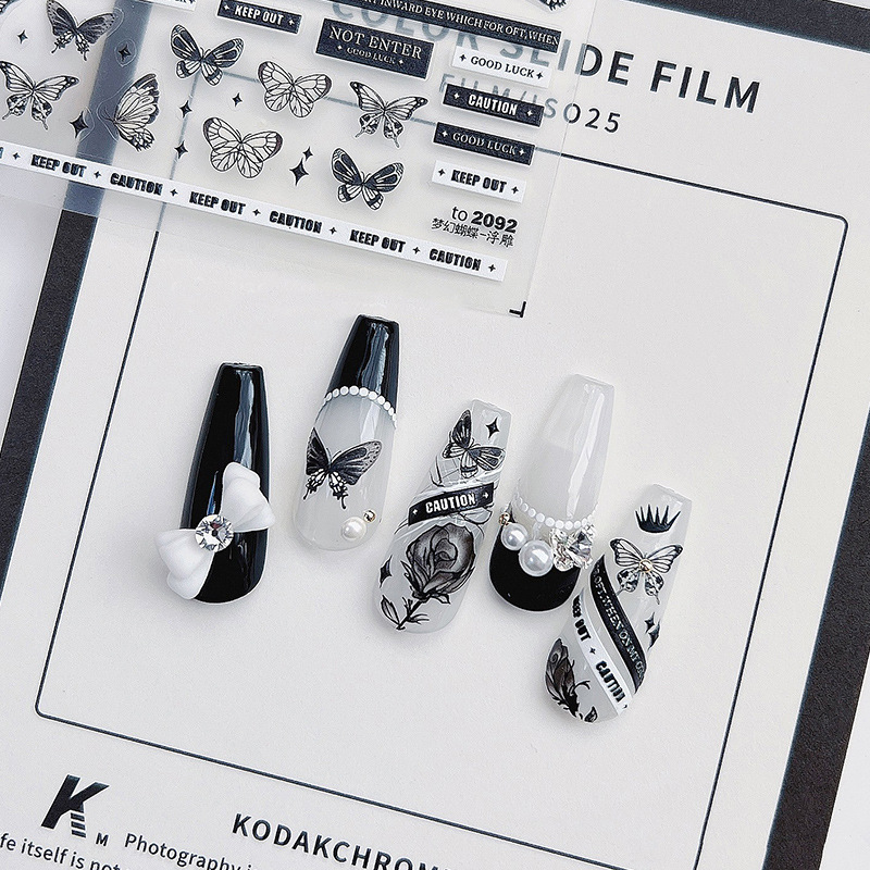 Tomoni en línea estilo de celebridad pegatinas de uñas cinta estilo de Chanel alivio mariposa letras inglesas estilo oscuro textura de uñas