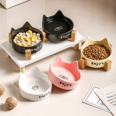 猫の碗の陶磁器の犬の碗の黒い碗の猫の茶碗の猫の食器の2つの一体型の猫の食糧の碗のペットの水の碗はひっくり返ることを防ぎます。