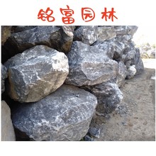 吉林黑山石流水置石水钵打造 大型黑山石景石石场供应 黑山石景观