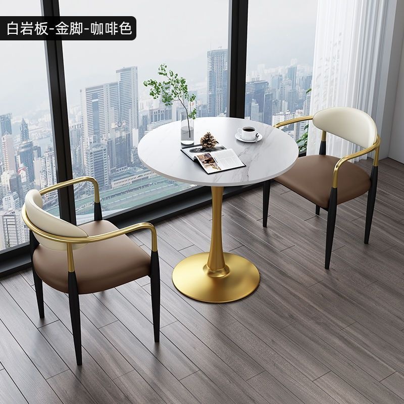 Gold legs + white rock slab + brown leather, one table and two chairs