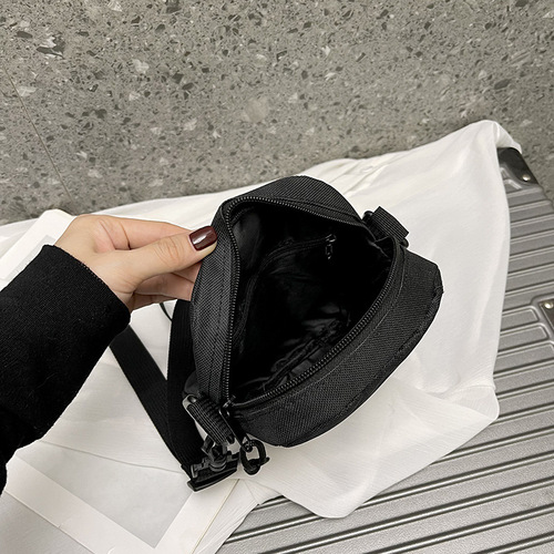 Oxford cloth casual crossbody bag for boys new Japanese style ins simple solid color versatile mobile phone bag women's street backpack