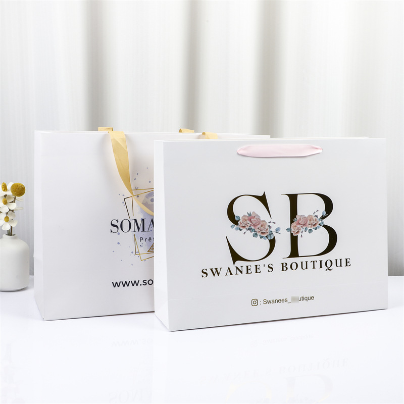 袋子包装礼品袋大衣厚手提袋印logo手拎袋衣服纸袋子UV印刷纸质