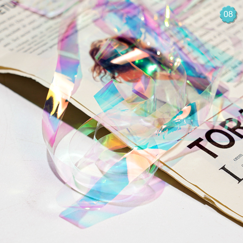 Nuevo arte de uñas transfronterizo cielo estrellado papel 1CM en caja Aurora papel de caramelo celofán arte de uñas joyería láser cielo estrellado papel