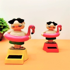 Cross-border wholesale creative intelligent induction swinging sun flower shaking head turtle fairy car interior decoration car ornaments