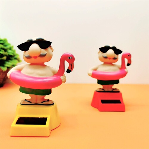 Cross-border wholesale creative intelligent induction swinging sun flower shaking head turtle fairy car interior decoration car ornaments