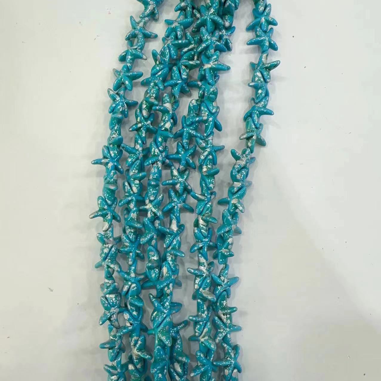 Ventas transfronterizas de coloridas estrellas de mar de piedra de pino cuentas semiacabadas DIY accesorios accesorios materiales de joyería hecha a mano