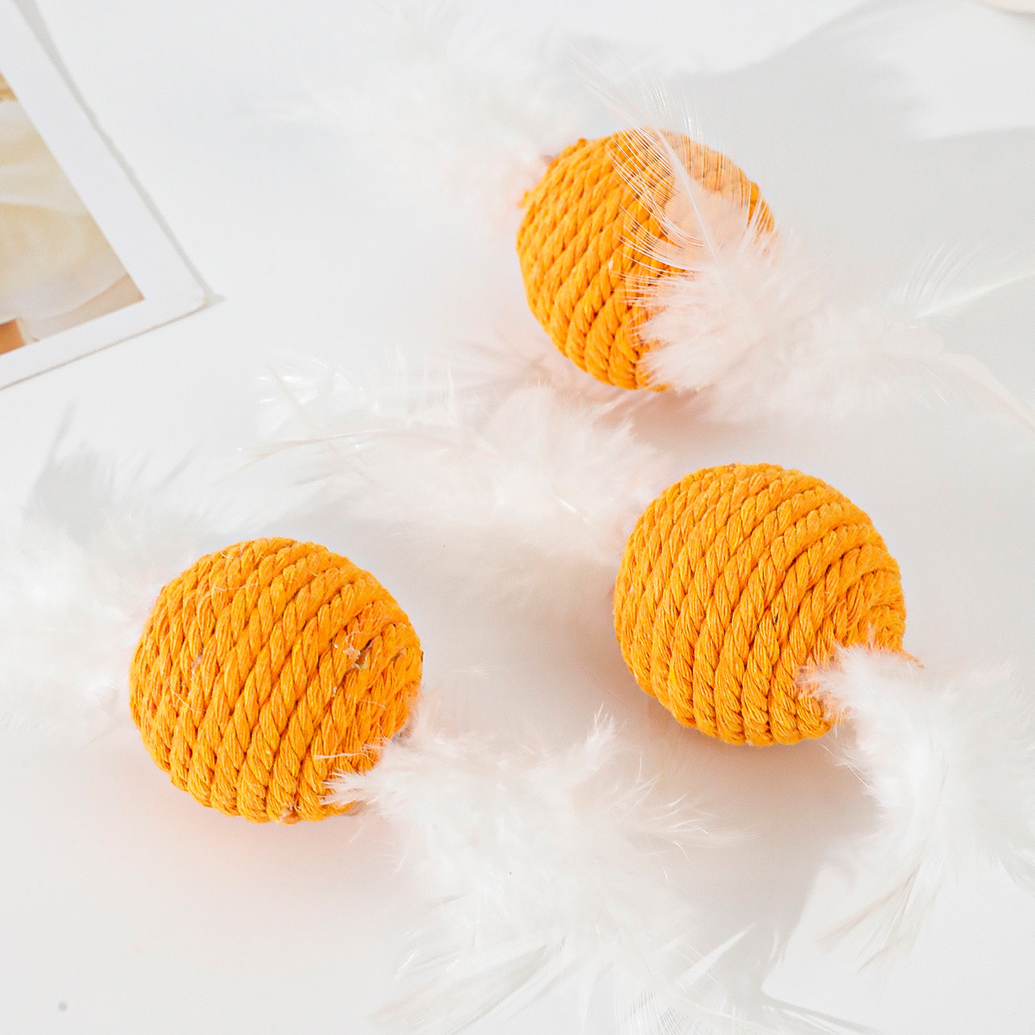 Venta al por mayor Macarons Serie de cuerda de algodón Juguetes para gatos Pelota de juguete para mascotas Cuerda de algodón Bola tejida Juguete para gatos