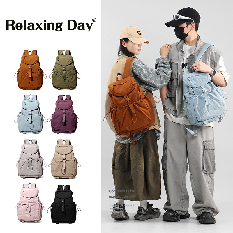 跨境双肩包时尚新潮女生休闲背包百搭纯色个性防泼水抽带韩版女包