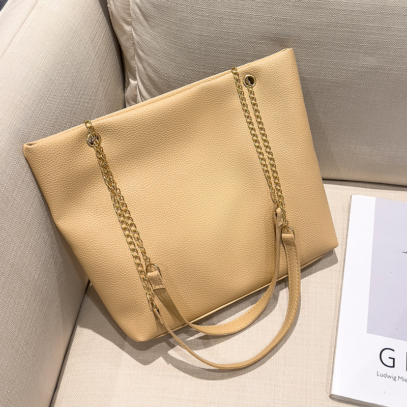 Bolsa de color caramelo tamaño medio 2024, bolsas de damas, bolsas de hombro simples, bolsas de compras para mujeres coreanas.