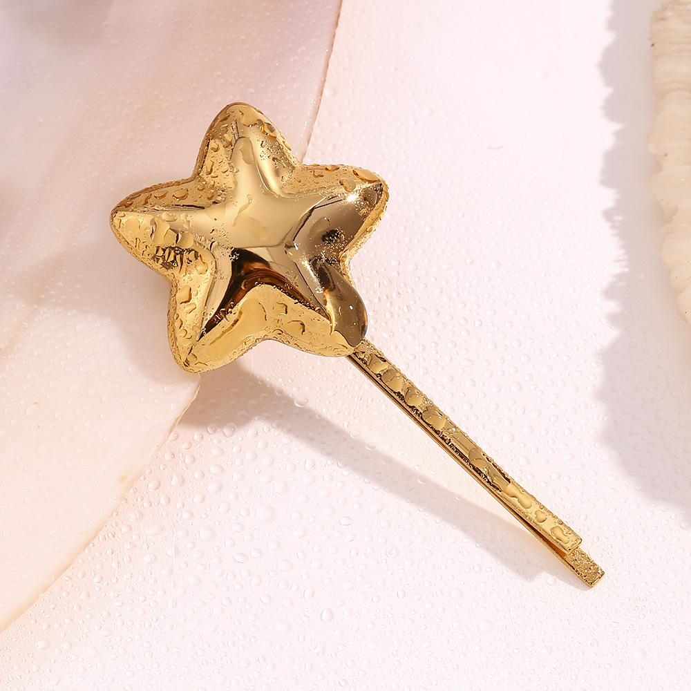 Moda unisex temperamento nicchia scoppio decorato con acciaio inossidabile placcato oro stella a cinque punte tridimensionale forcina donna_voghion.com
