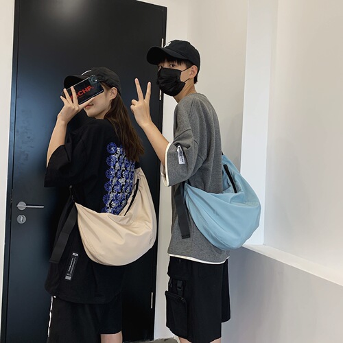 Unisex style bag new waterproof nylon dumpling bag for women Korean version solid color large capacity single shoulder crossbody bag for men